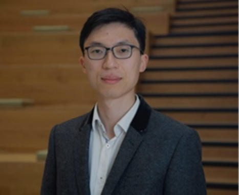 Xilin Xia Man with glasses wearing a suit