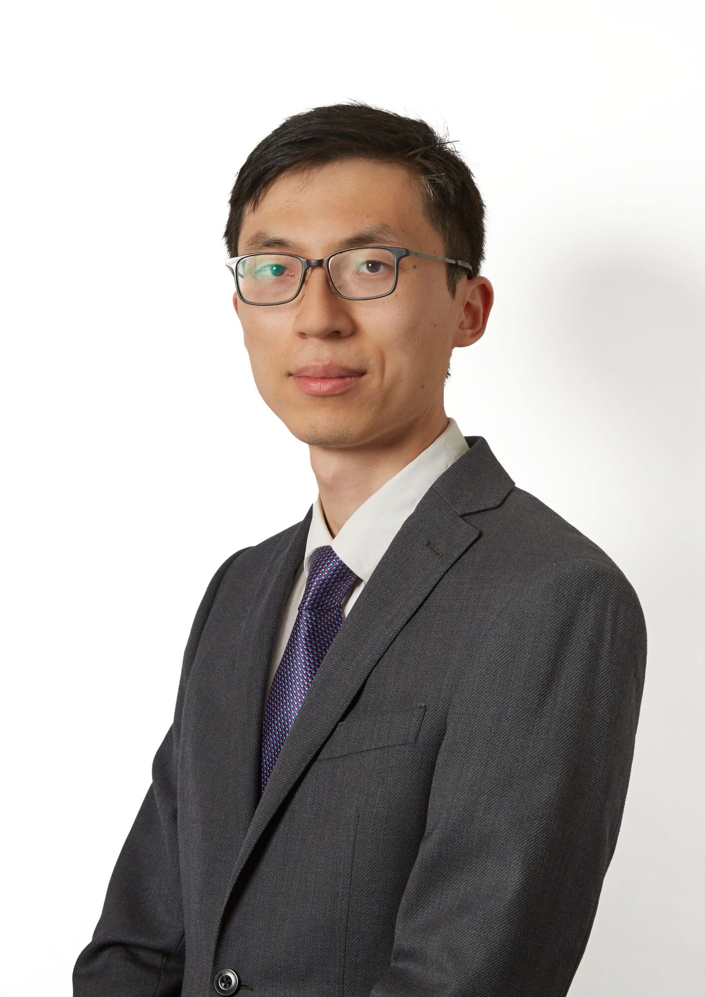 XilinXia1 Man with glasses looking at camera