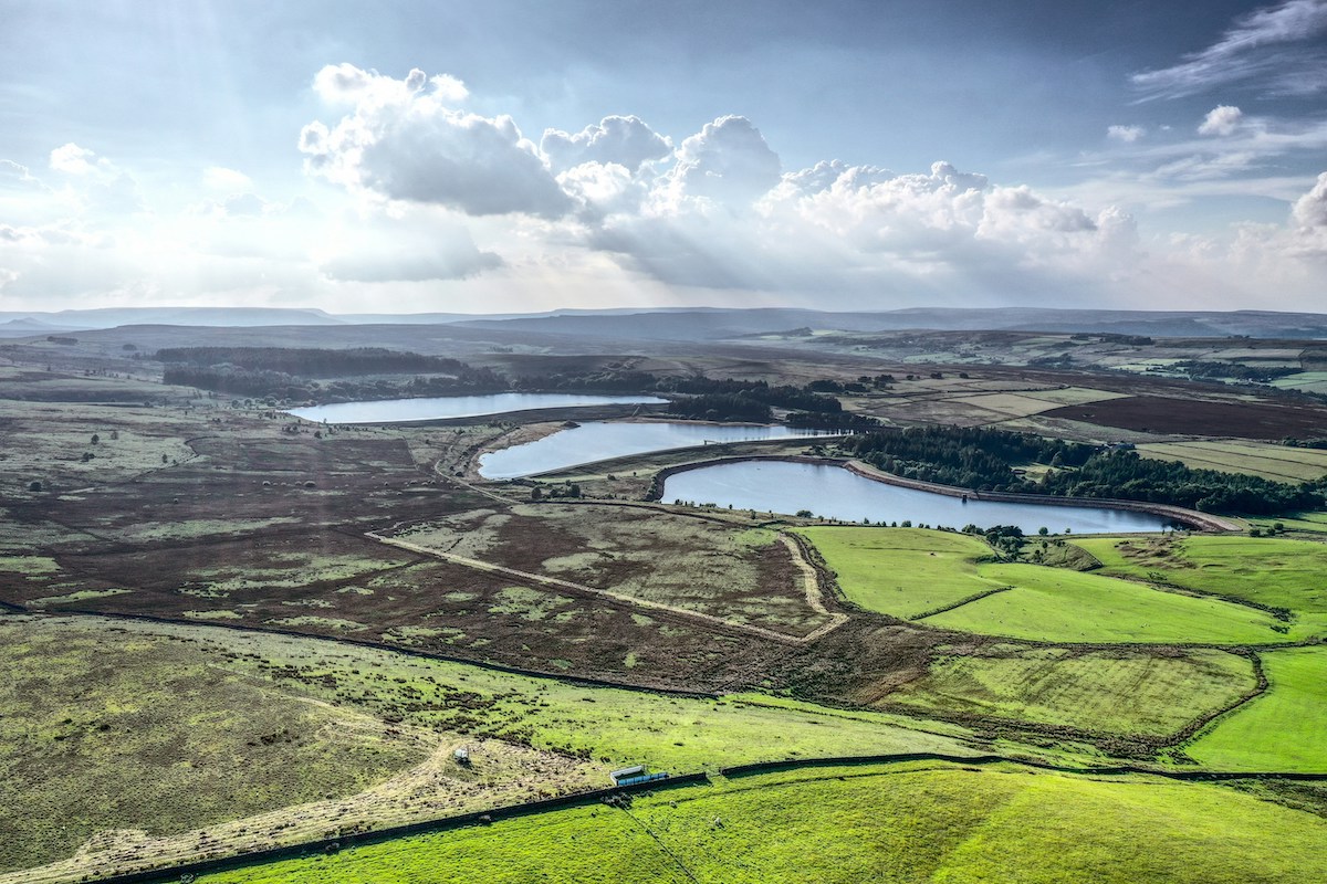 Landscape of fields and bodies of water