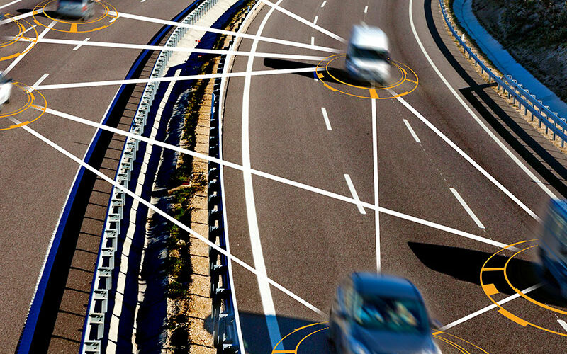 Motorway showing connected cars