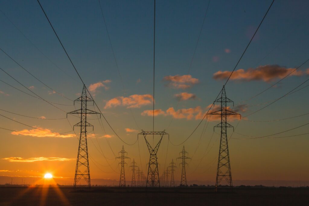 Electricity pylons at sunset