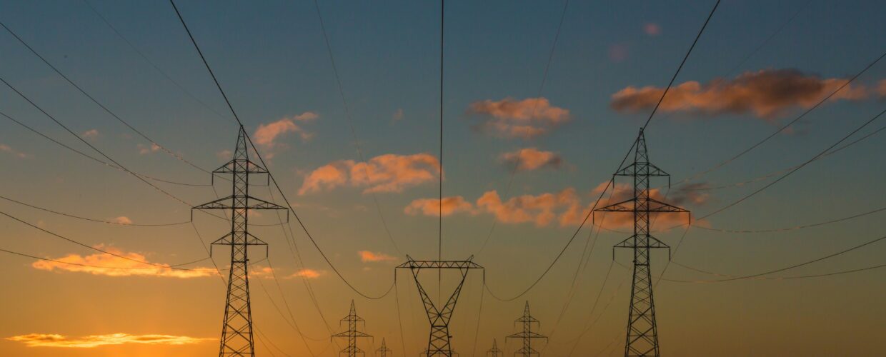 Electricity pylons at sunset